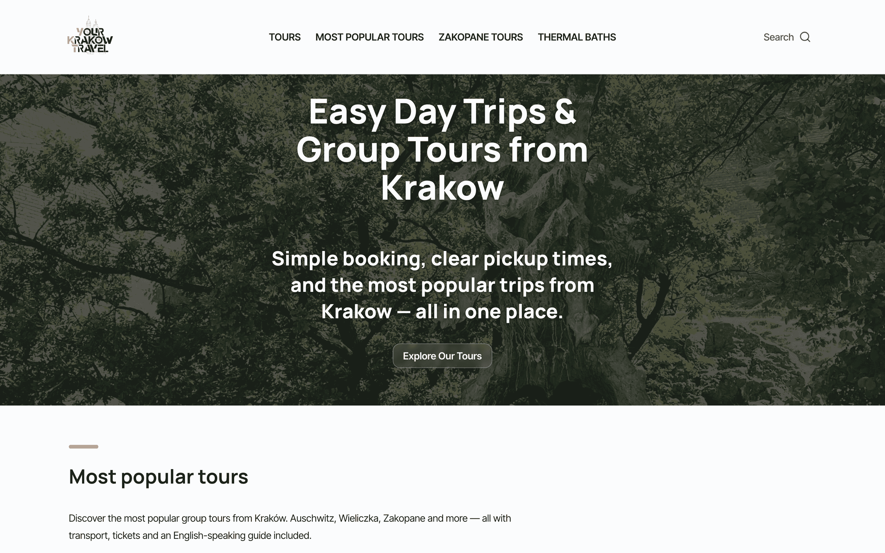 Strona yourkrakowtravel.com na komputerze — nagłówek z ofertą wycieczek jednodniowych